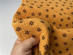 Gauze - florlet dobbelt gauze i lys karry med brune motiver